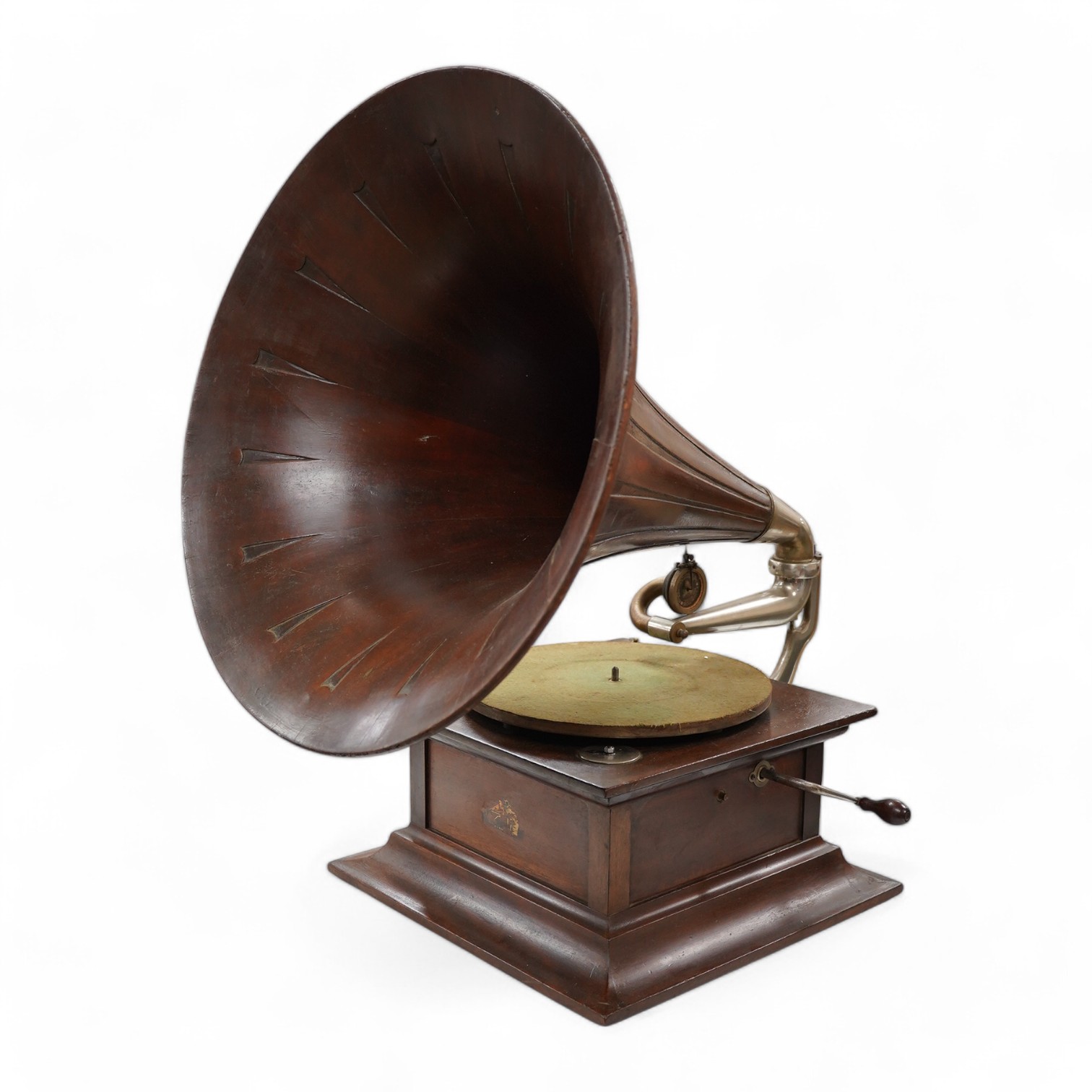 An HMV tabletop mahogany gramophone player with large laminated wooden horn, diameter of horn 55cm. HMV transfer labels to both body and horn. Condition - fair.